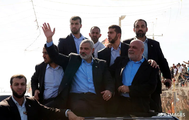 Palestinians celebrate the release of prisoners in Gaza Strip, Tuesday, Oct. 18, 2011. Hamas agreed to release Israeli soldier Galit Schalit in exchange for 1,027 Palestinian prisoners, many of them serving life sentence...