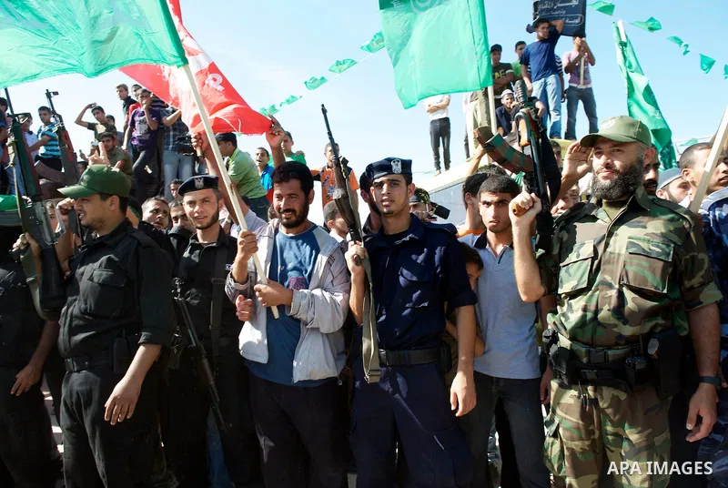 Palestinians celebrate the release of prisoners in Gaza Strip, Tuesday, Oct. 18, 2011. Hamas agreed to release Israeli soldier Galit Schalit in exchange for 1,027 Palestinian prisoners, many of them serving life sentence...