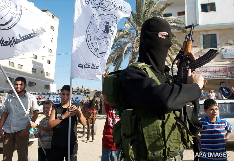 Palestinians celebrate the release of prisoners in Gaza Strip, Tuesday, Oct. 18, 2011. Hamas agreed to release Israeli soldier Galit Schalit in exchange for 1,027 Palestinian prisoners, many of them serving life sentence...