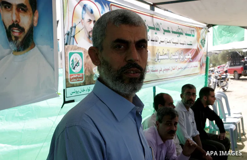 A Hamas freed Palestinian prisoner, Yehia Sinwar is greeted by relatives and friends at a tent near his house upon his return in the southern Gaza Strip town of Khan Yunis on October 19, 2011. Israeli soldier Gilad Shali...