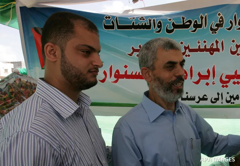 A Hamas freed Palestinian prisoner, Yehia Sinwar is greeted by relatives and friends at a tent near his house upon his return in the southern Gaza Strip town of Khan Yunis on October 19, 2011. Israeli soldier Gilad Shali...