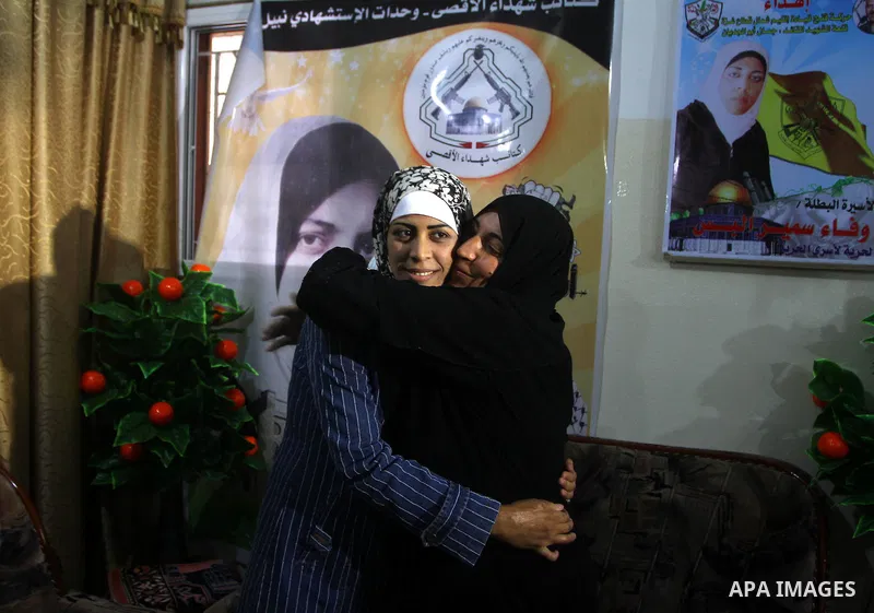 Freed Palestinian prisoner Wafa Albes hugs a relative following her release from an Israeli jail on October 19, 2011 in the Jabalia refugee camp. Wafa has been jailed in Israel since 2005. The Palestinian Hamas movement...