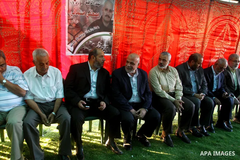 Palestinian prime minister in Gaza Strip, Ismail Haniya visits the tent erected to welcome Palestinian prisoners released in exchange for the captured Israeli soldier Gilad Schalit in Gaza City, Wednesday, Oct. 19, 2011....