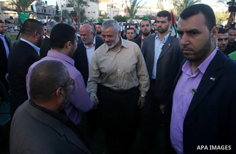 Palestinian prime minister in Gaza Strip, Ismail Haniya visits the tent erected to welcome Palestinian prisoners released in exchange for the captured Israeli soldier Gilad Schalit in Gaza City, Wednesday, Oct. 19, 2011....