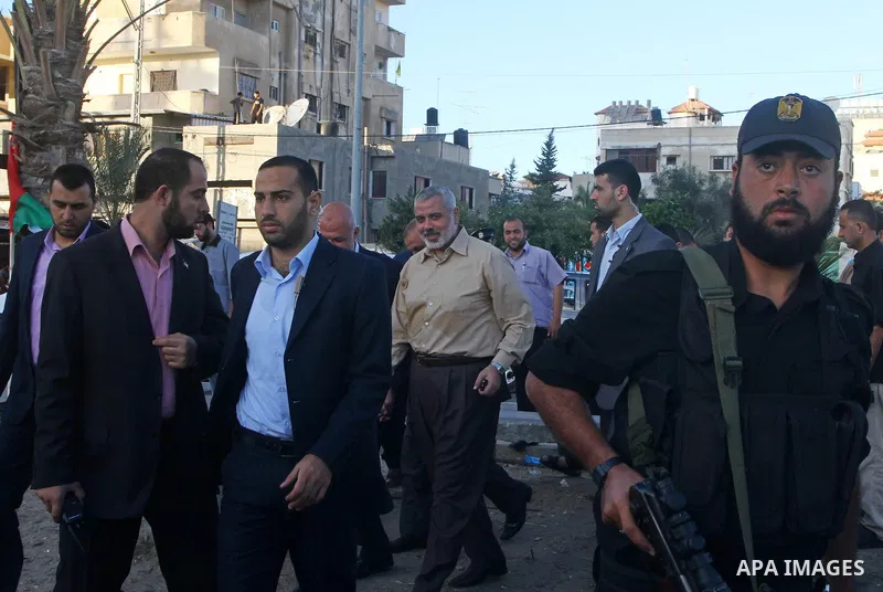 Palestinian prime minister in Gaza Strip, Ismail Haniya visits the tent erected to welcome Palestinian prisoners released in exchange for the captured Israeli soldier Gilad Schalit in Gaza City, Wednesday, Oct. 19, 2011....