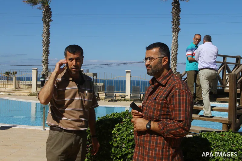 A freed Palestinian prisoner uses his mobile phonel at Al-Mashtal hotel, where he and other former prisoners are currently staying, in the Gaza Strip Oct. 20, 2011. Israeli soldier Gilad Shalit and hundreds of Palestinia...