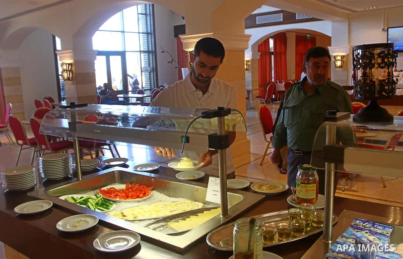 Freed Palestinian prisoners sit in the cafe of Al-Mashtal hotel, where they staying, in the Gaza Strip October 20, 2011. Israeli soldier Gilad Shalit and hundreds of Palestinians crossed Israel's borders in opposite dire...