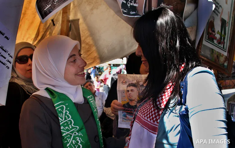 Palestinian Linan Abu Glma , prisoner who was released by the Israeli authorities on Tuesday receives well wishers in the West Bank city of Nablus Thursday , Oct. 20, 2011. Hundreds of Palestinian prisoners were released...