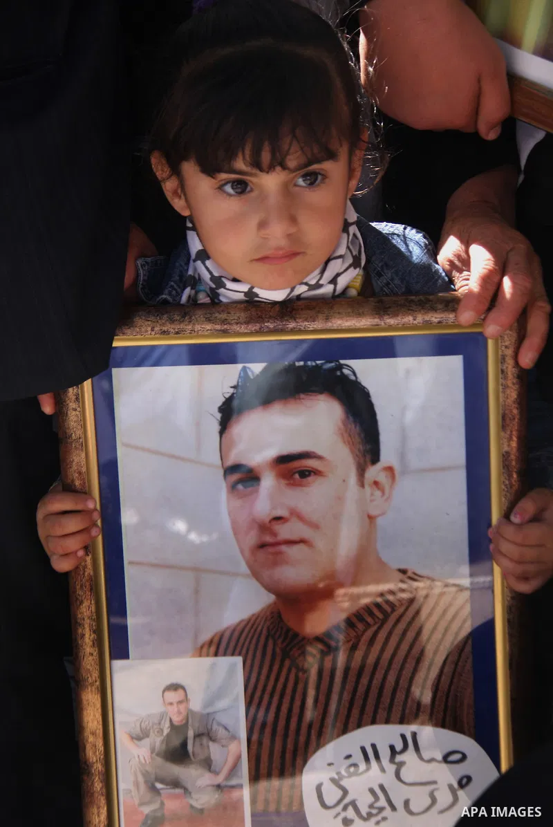 Palestinian Linan Abu Glma , prisoner who was released by the Israeli authorities on Tuesday receives well wishers in the West Bank city of Nablus Thursday , Oct. 20, 2011. Hundreds of Palestinian prisoners were released...