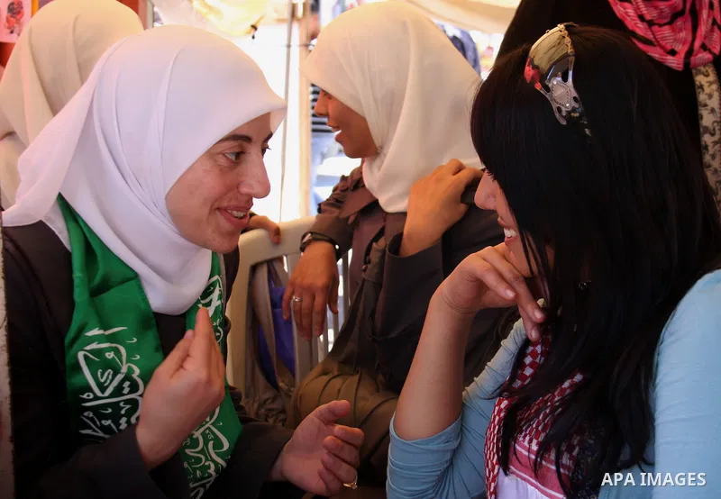 Palestinian Linan Abu Glma , prisoner who was released by the Israeli authorities on Tuesday receives well wishers in the West Bank city of Nablus Thursday , Oct. 20, 2011. Hundreds of Palestinian prisoners were released...