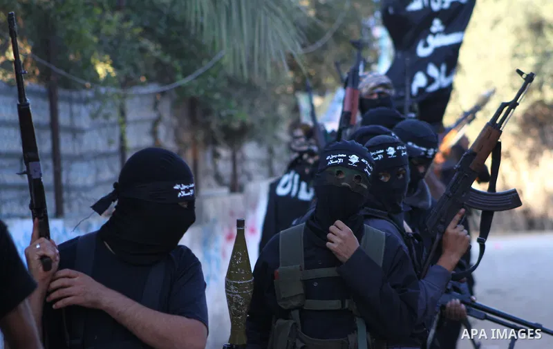 Army of Islam militants patrol during their visit to the freed Palestinian prisoners in Nusairat in central Gaza Strip October 20, 2011.The time is not right for meaningful Israeli-Palestinian peace talks, Palestinian Pr...