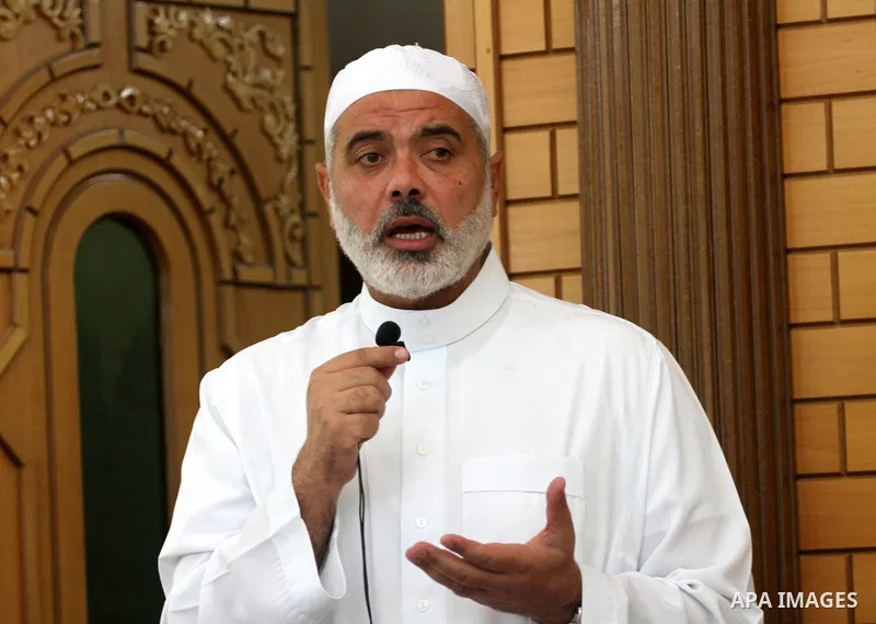 Hamas leader Ismail Haniya attends Friday prayer with Freed Palestinian prisoners in Gaza City on October 21, 2011. Hamas rulers are enjoying a surge in popularity following the release earlier this week of 477 Palestini...
