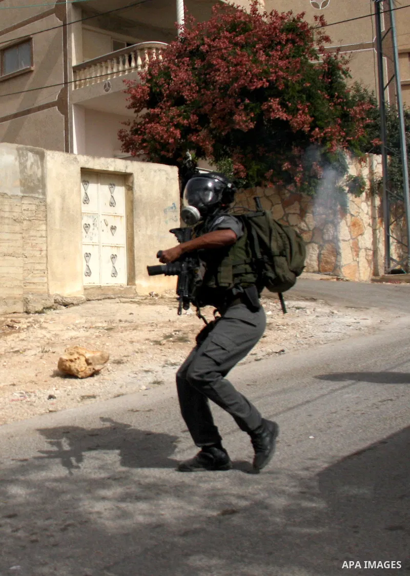 Israeli border police officers clash with Palestinian demonstrators as they demand access to their land near Kufr Qaddum, close to the northern West Bank Jewish settlement of Kdumim, Friday, Oct. 21, 2011. Photo by Wagdi...