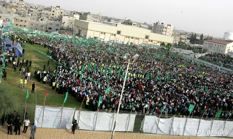 Palestinian supporters of the Islamic group Hamas celebrate the release of hundreds of prisoners following a swap with captured Israeli soldier Gilad Shalit on October 21, 2011 in Khan Yunis, southern Gaza Strip. Hamas r...