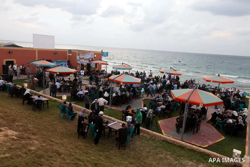 Freed Palestinian prisoners and their relatives attend a celebration on Gaza city beach on Oct. 25,2011. Prisoners released to the Gaza Strip in a dramatic swap for a captive Israeli soldier Gilad Shalit last week after...