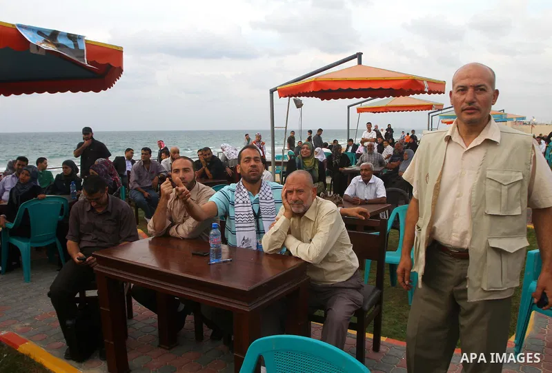 Freed Palestinian prisoners and their relatives attend a celebration on Gaza city beach on Oct. 25,2011. Prisoners released to the Gaza Strip in a dramatic swap for a captive Israeli soldier Gilad Shalit last week after...
