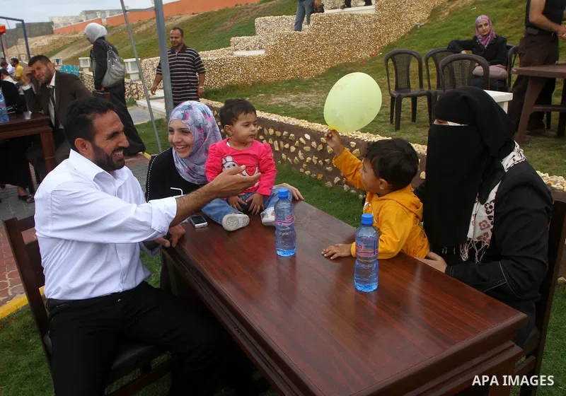 Freed Palestinian prisoners and their relatives attend a celebration on Gaza city beach on Oct. 25,2011. Prisoners released to the Gaza Strip in a dramatic swap for a captive Israeli soldier Gilad Shalit last week after...