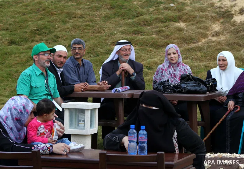 Freed Palestinian prisoners and their relatives attend a celebration on Gaza city beach on Oct. 25,2011. Prisoners released to the Gaza Strip in a dramatic swap for a captive Israeli soldier Gilad Shalit last week after...