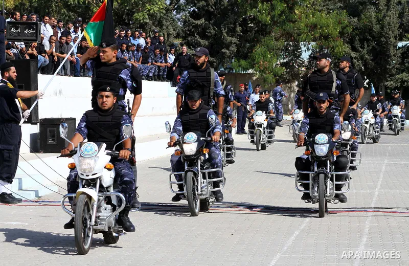 Hamas police officers demonstrate their skills during a ceremony in Gaza City in front of the media and Palestinian prisoners released in a recent swap between Hamas and Israel October 27, 2011. The Egyptian-brokered swa...
