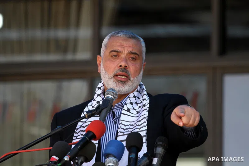 Palestinian prime minister in Gaza Strip, Ismail Haniya attends a celebration with prisoners, who released in a recent swap between Hamas and Israel, organised by Hamas movement in Gaza city on October 27, 2011. The Egyp...