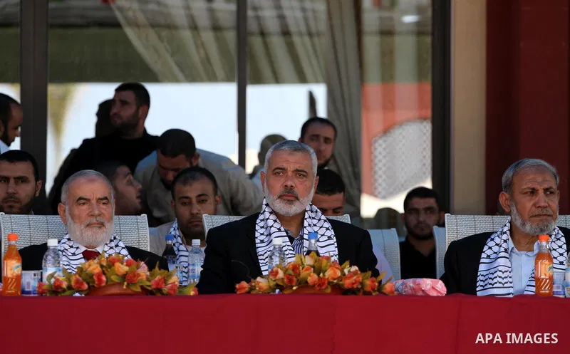 Palestinian prime minister in Gaza Strip, Ismail Haniya attends a celebration with prisoners, who released in a recent swap between Hamas and Israel, organised by Hamas movement in Gaza city on October 27, 2011. The Egyp...