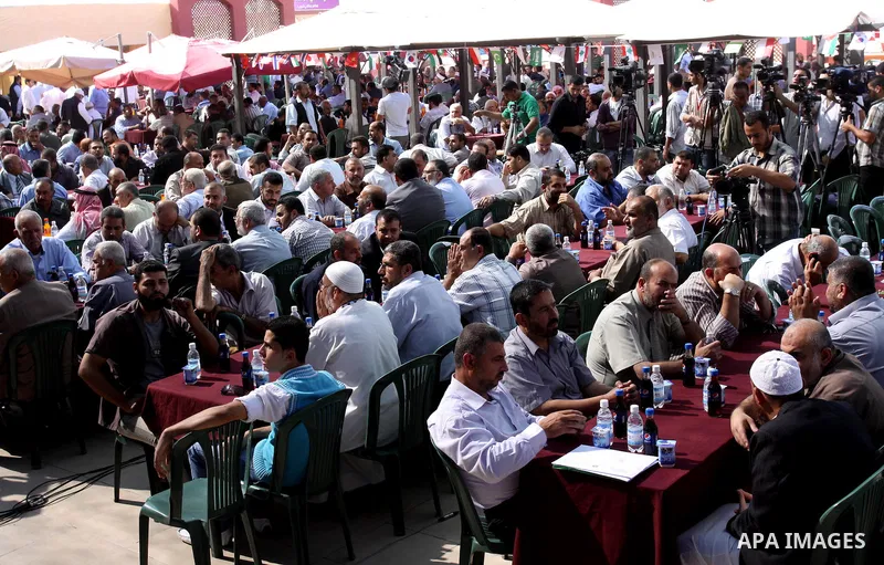 Palestinian prisoners, who released in a recent swap between Hamas and Israel, attend a celebration organised by Hamas movement in Gaza city on October 27, 2011. The Egyptian-brokered swap between Israel and Hamas Islami...