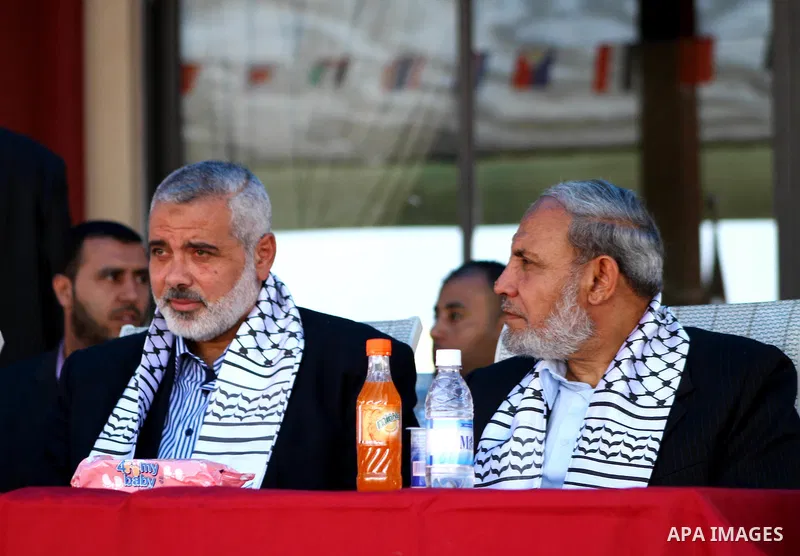 Palestinian prime minister in Gaza Strip, Ismail Haniya attends a celebration with prisoners, who released in a recent swap between Hamas and Israel, organised by Hamas movement in Gaza city on October 27, 2011. The Egyp...