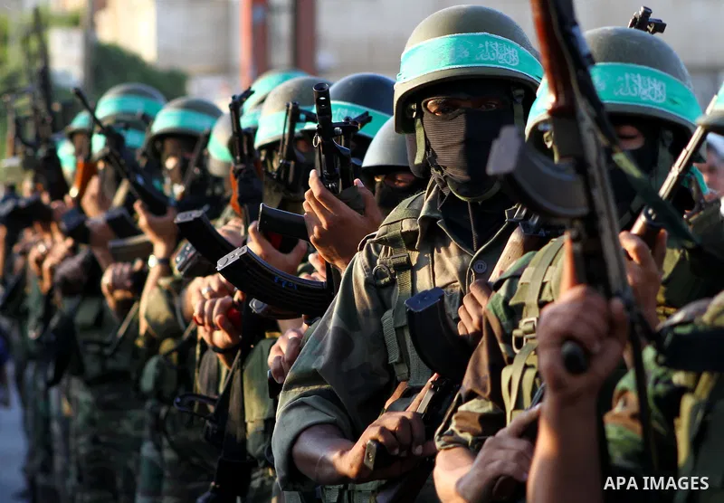 Hamas militants take part in a celebration of the recent release of hundreds of Palestinians by Israel in the central Gaza Strip, Friday, Oct. 28, 2011. Hundreds of Palestinians were released in exchange for captured Isr...