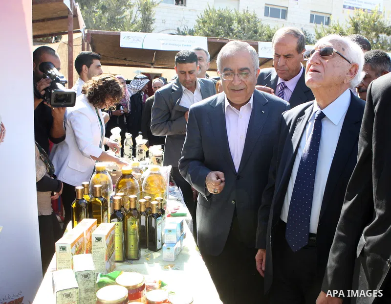 Palestinian Prime Minister Salam Fayyad attends the opening Festival of the olive harvest eleventh century in Bethlehem on Oct. 29, 2011. Photo by Mustafa Abu Dayeh
