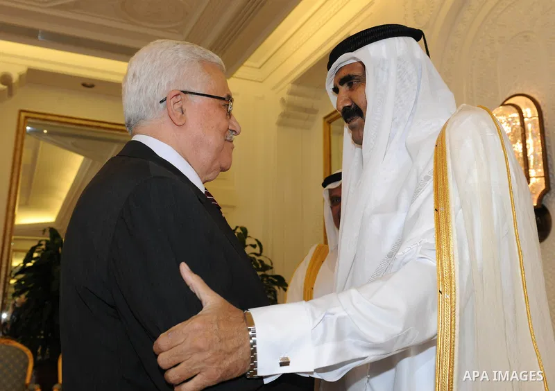 Palestinian President Mahmoud Abbas (Abu Mazen) during a meeting with the Emir of Qatar Sheikh Hamad bin Khalifa Al Thani. in Qatar on Oct. 30, 2011.Photo by Thaer Ganaim