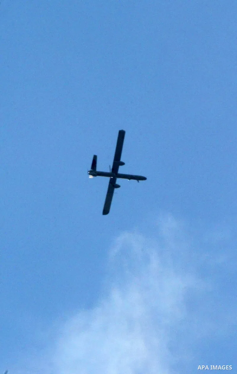 An Israeli drone is seen over Rafah town in the southern Gaza Strip on Oct. 30, 2011. An Egyptian-brokered truce failed to take hold on Sunday to halt violence between Israel and Gaza militants in which nine Palestinian...