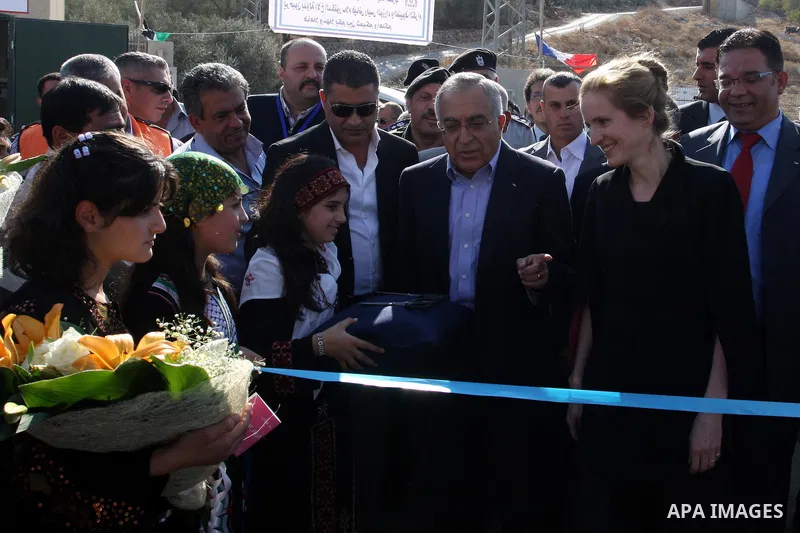 Palestinian Prime Minister Salam Fayyad and French Minister of Ecology, Sustainable development, transport, and housing, Nathalia Kosciusko- Morizet inaugurate a water pump in Maythalon village, near Jenin, the West Bank...