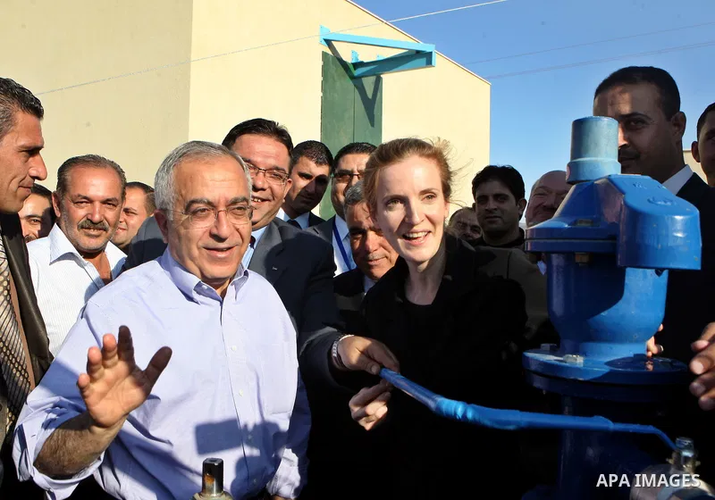 Palestinian Prime Minister Salam Fayyad andFrench Ecology Minister Nathalie Kosciusko-Morizettake part in the inauguration of a water project in Maythalon village, close to the West Bank city of Jenin on Nov. 01, 2011. P...