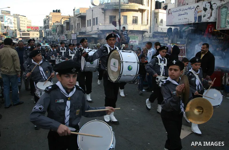 Palestinians shopping to celebrate Eid al-Adha festival in a market of Gaza City on Nov. 4, 2011. Muslims across the world are preparing to celebrate the annual festival of Eid al-Adha, or the Festival of Sacrifice. Phot...