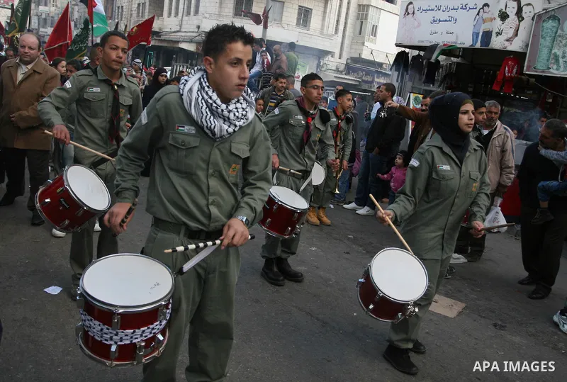 Palestinians shopping to celebrate Eid al-Adha festival in a market of Gaza City on Nov. 4, 2011. Muslims across the world are preparing to celebrate the annual festival of Eid al-Adha, or the Festival of Sacrifice. Phot...