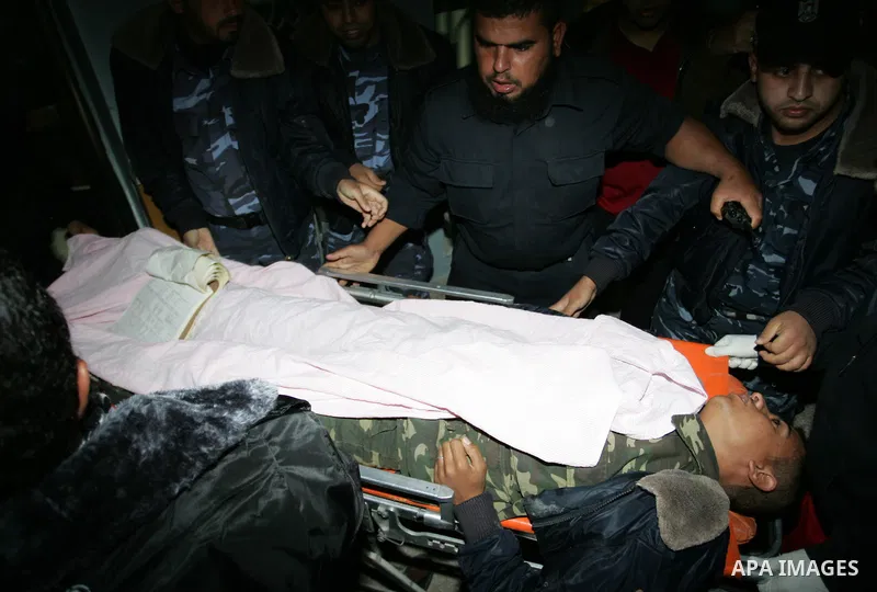 A wounded Palestinian youth is wheeled into a hospital in Khan Younis, southern Gaza Strip, Saturday, Nov. 5, 2011. A Palestinian official said that one of Islamic Jihads militants was killed and several others were woun...