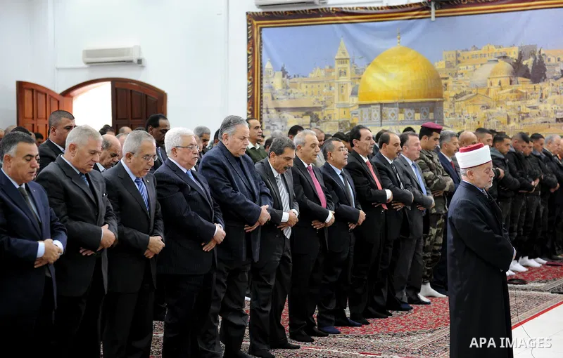 Palestinian President Mahmoud Abbas attends Eid al-Adah prayers in the West Bank town of Ramallah on 6,2011 marking the Eid al-Adha holiday, celebrated at the end of the 'Hajj' pilgrimage to Mecca.. Photo by Thaer Ganaim