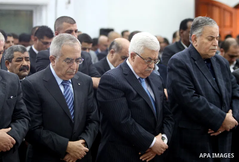 Palestinian President Mahmoud Abbas attends Eid al-Adah prayers in the West Bank town of Ramallah on 6,2011 marking the Eid al-Adha holiday, celebrated at the end of the 'Hajj' pilgrimage to Mecca.. Photo by Thaer Ganaim