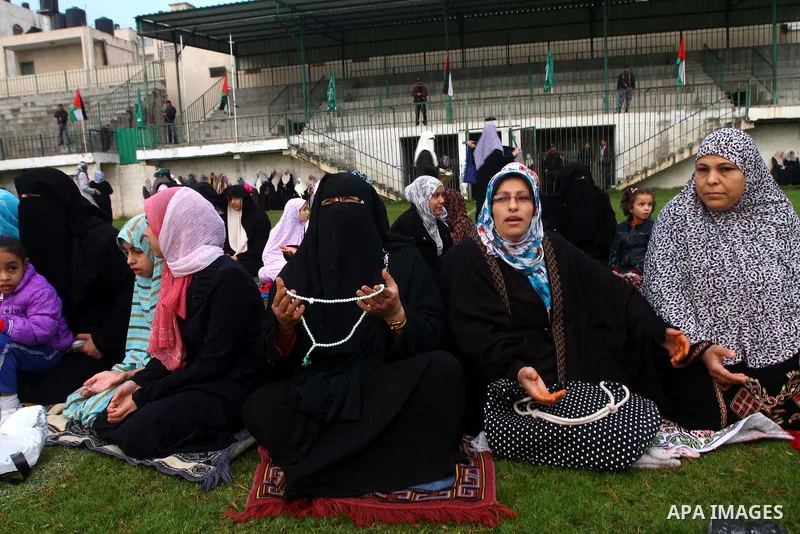 Palestinians attend Eid al-Adha prayers in Gaza city, Sunday, Nov. 6, 2011. Muslims worldwide celebrate Eid al-Adha, or the Feast of the Sacrifice by sacrificial killings of livestock to commemorate the religious story o...