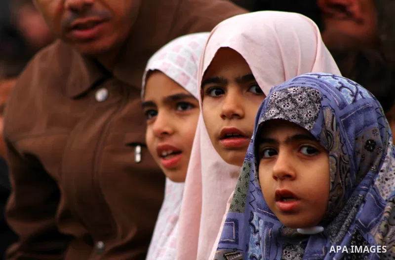 Palestinians attend Eid al-Adha prayers in Gaza city, Sunday, Nov. 6, 2011. Muslims worldwide celebrate Eid al-Adha, or the Feast of the Sacrifice by sacrificial killings of livestock to commemorate the religious story o...