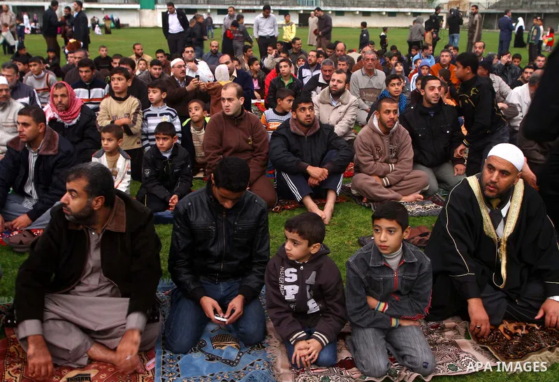 Palestinians attend Eid al-Adha prayers in Gaza city, Sunday, Nov. 6, 2011. Muslims worldwide celebrate Eid al-Adha, or the Feast of the Sacrifice by sacrificial killings of livestock to commemorate the religious story o...