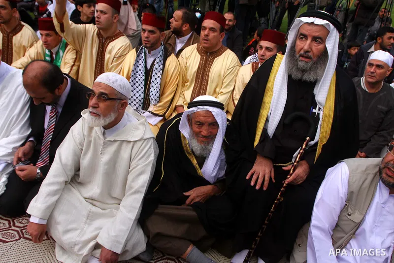 Palestinians attend Eid al-Adha prayers in Gaza city, Sunday, Nov. 6, 2011. Muslims worldwide celebrate Eid al-Adha, or the Feast of the Sacrifice by sacrificial killings of livestock to commemorate the religious story o...