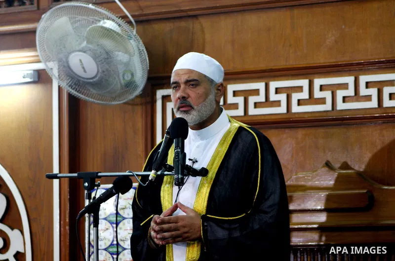 Palestinian prime minister in Gaza Strip, Ismail Haniya attends the prayers of Eid al-Adha celebrations in Gaza City, Sunday, Nov. 6, 2011. Muslims worldwide celebrate Eid al-Adha, or the Feast of the Sacrifice, by sacri...