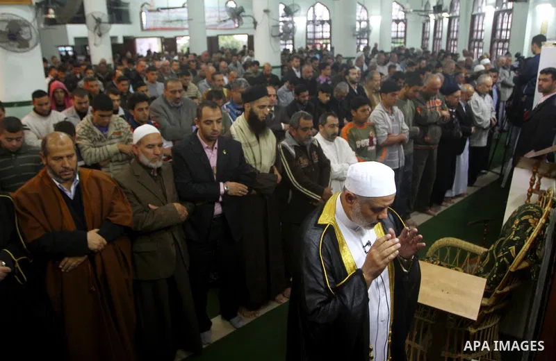 Palestinian prime minister in Gaza Strip, Ismail Haniya attends the prayers of Eid al-Adha celebrations in Gaza City, Sunday, Nov. 6, 2011. Muslims worldwide celebrate Eid al-Adha, or the Feast of the Sacrifice, by sacri...