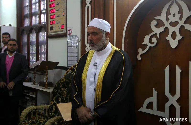 Palestinian prime minister in Gaza Strip, Ismail Haniya attends the prayers of Eid al-Adha celebrations in Gaza City, Sunday, Nov. 6, 2011. Muslims worldwide celebrate Eid al-Adha, or the Feast of the Sacrifice, by sacri...