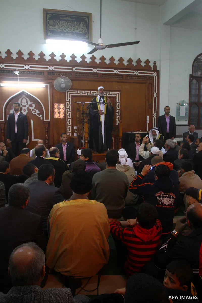 Palestinian prime minister in Gaza Strip, Ismail Haniya attends the prayers of Eid al-Adha celebrations in Gaza City, Sunday, Nov. 6, 2011. Muslims worldwide celebrate Eid al-Adha, or the Feast of the Sacrifice, by sacri...