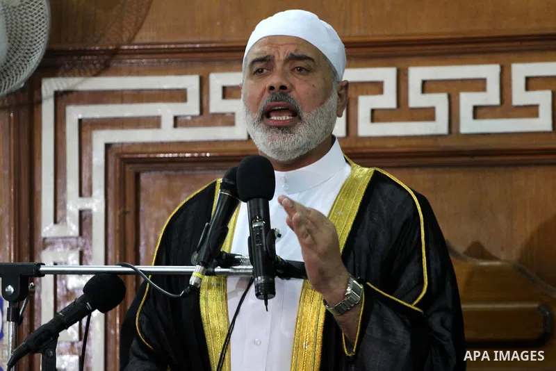Palestinian prime minister in Gaza Strip, Ismail Haniya attends the prayers of Eid al-Adha celebrations in Gaza City, Sunday, Nov. 6, 2011. Muslims worldwide celebrate Eid al-Adha, or the Feast of the Sacrifice, by sacri...