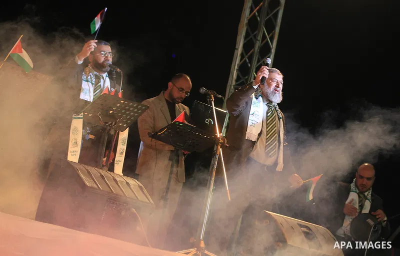 A religious eulogy band perform during islamic celebration of the upcoming Eid al-Adha fetival in Khan Younis, southern Gaza Strip on November 8, 2011. Photo by Majdi Fathi