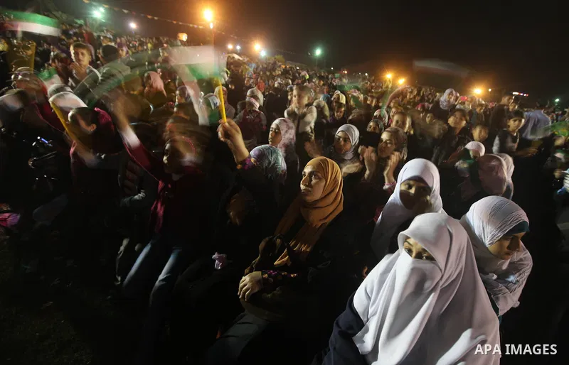 A religious eulogy band perform during islamic celebration of the upcoming Eid al-Adha fetival in Khan Younis, southern Gaza Strip on November 8, 2011. Photo by Majdi Fathi
