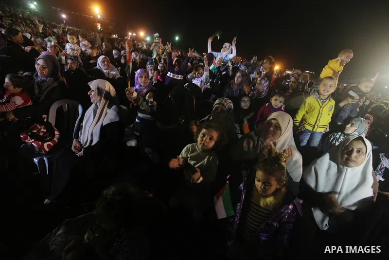 A religious eulogy band perform during islamic celebration of the upcoming Eid al-Adha fetival in Khan Younis, southern Gaza Strip on November 8, 2011. Photo by Majdi Fathi